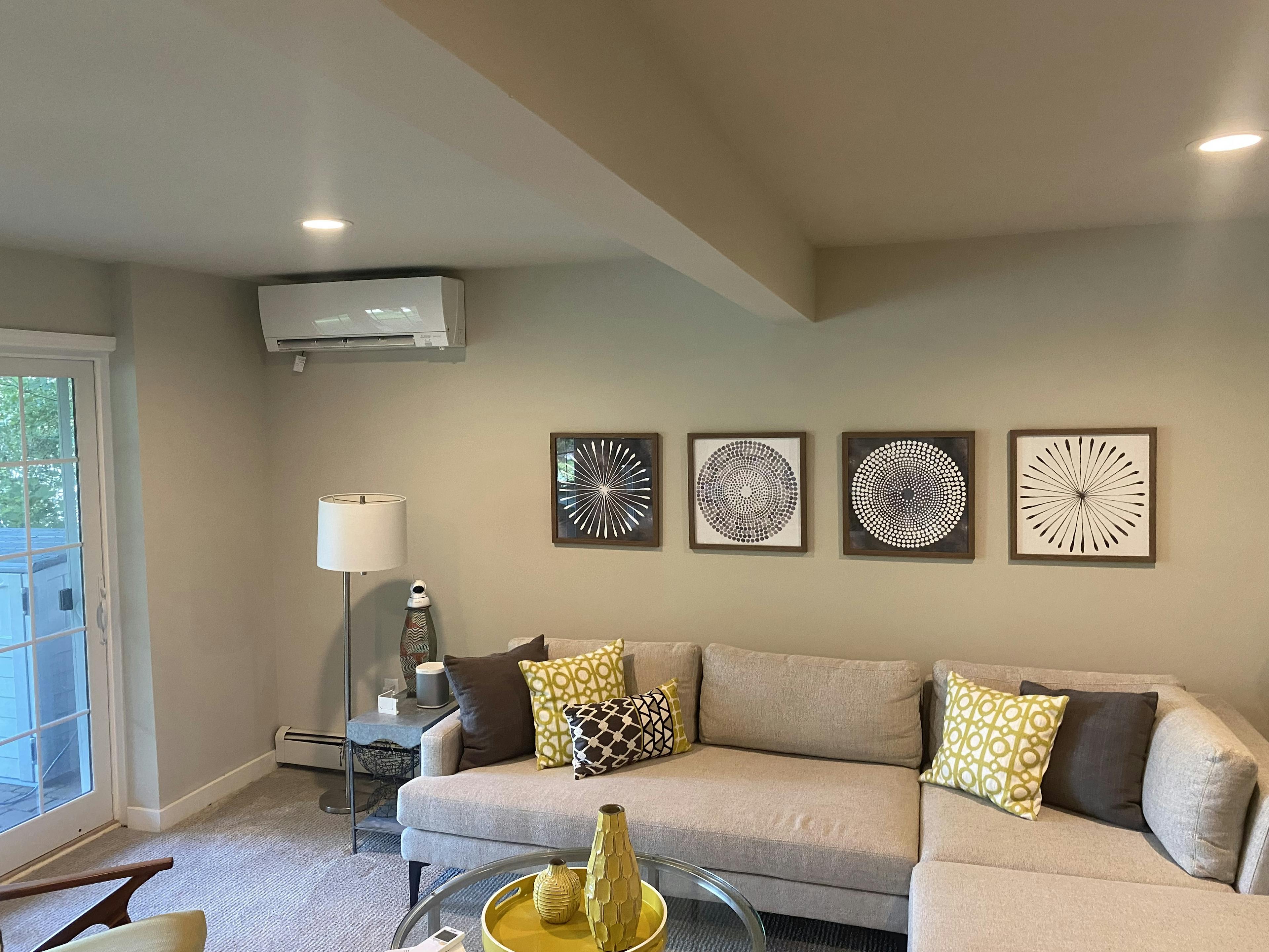 Living room with ductless heating & cooling system
